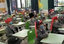 杭州小学生戴一米帽上课现场照片曝光 一米帽长什么样？